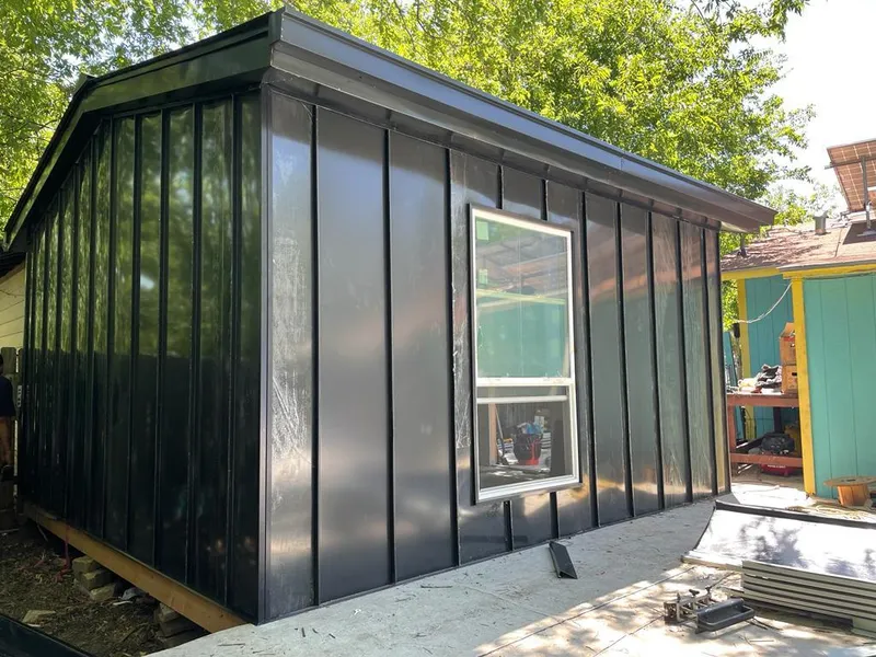 Black standing seam metal wall panels for Roof Inspection in Neenah