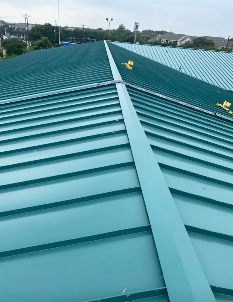 Green commercial metal roof ridge and valley for Metal Roof Repair in Neenah